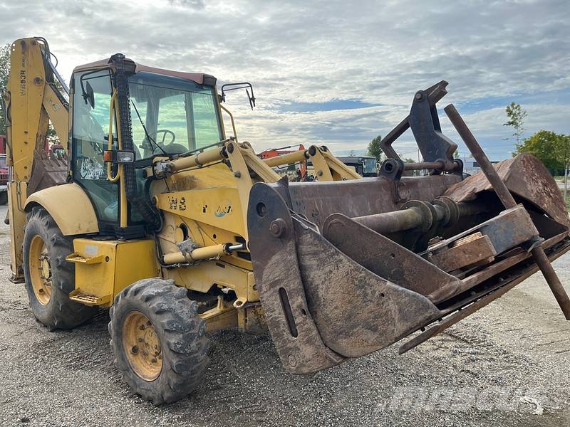 Komatsu WB 93 R لوادر ذات جرافات عكسية