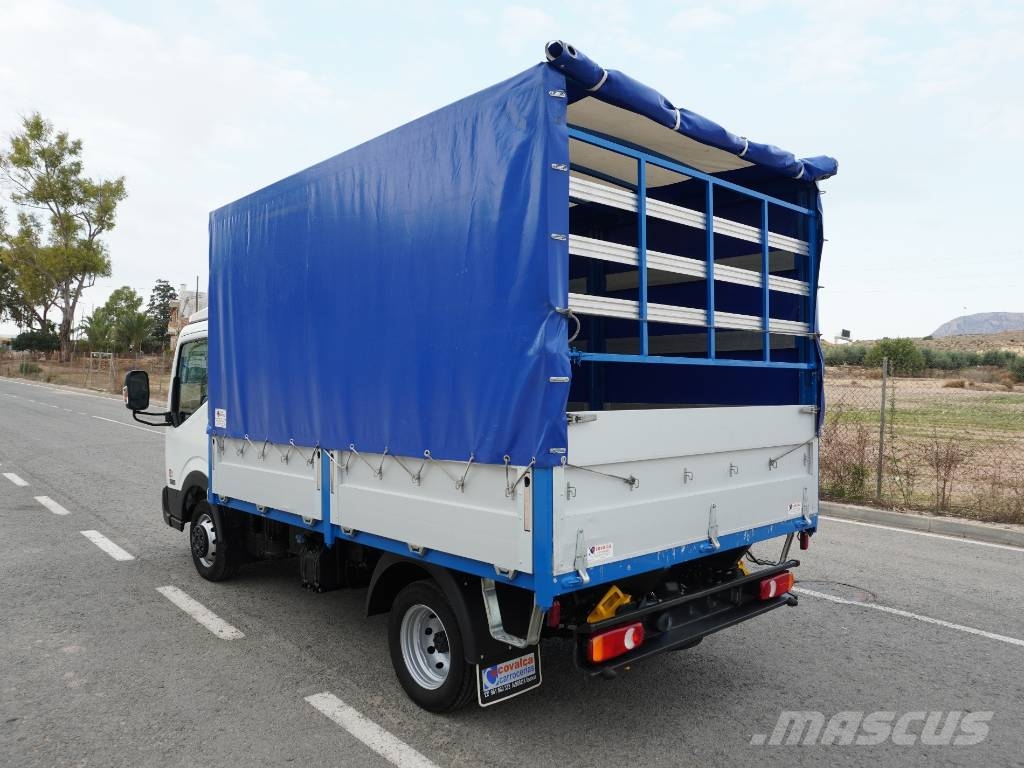 Nissan NT400 35.13 **62.000** Camion cu prelata