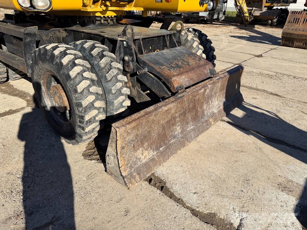 CAT M 318 D Mobilbagger
