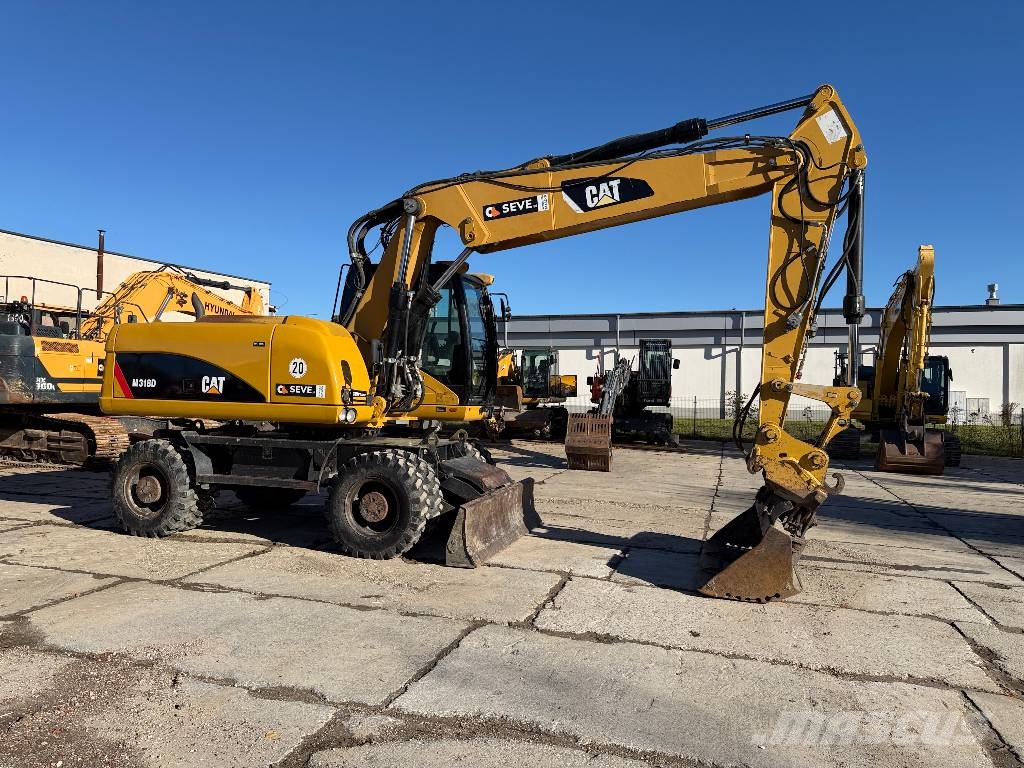 CAT M 318 D Mobilbagger