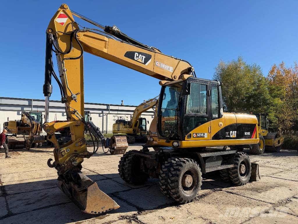CAT M 318 D Mobilbagger