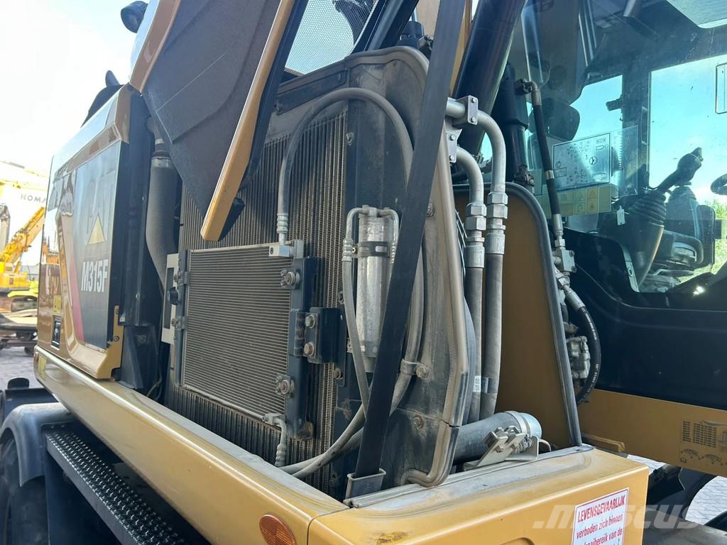 CAT M315F Ratiniai ekskavatoriai