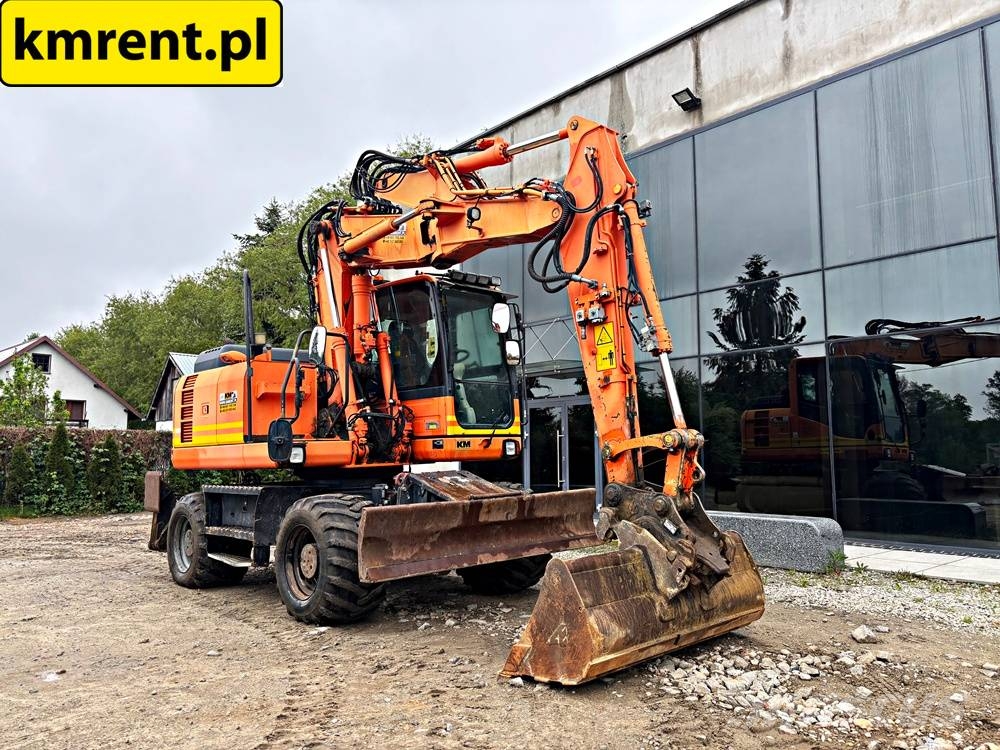 Komatsu PW 148-8 KOPARKA KOŁOWA 2014R. | CAT LIEBHERR 315 Escavatori gommati