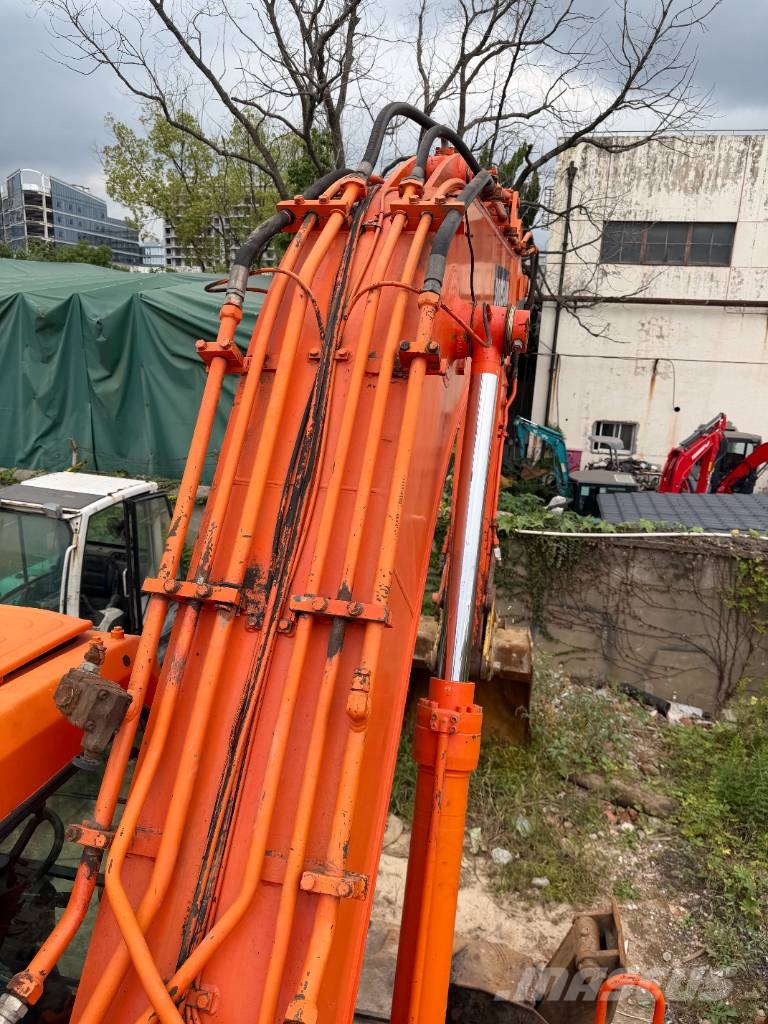 Doosan DH 210 W-7 Source factory Bagri na kolesih