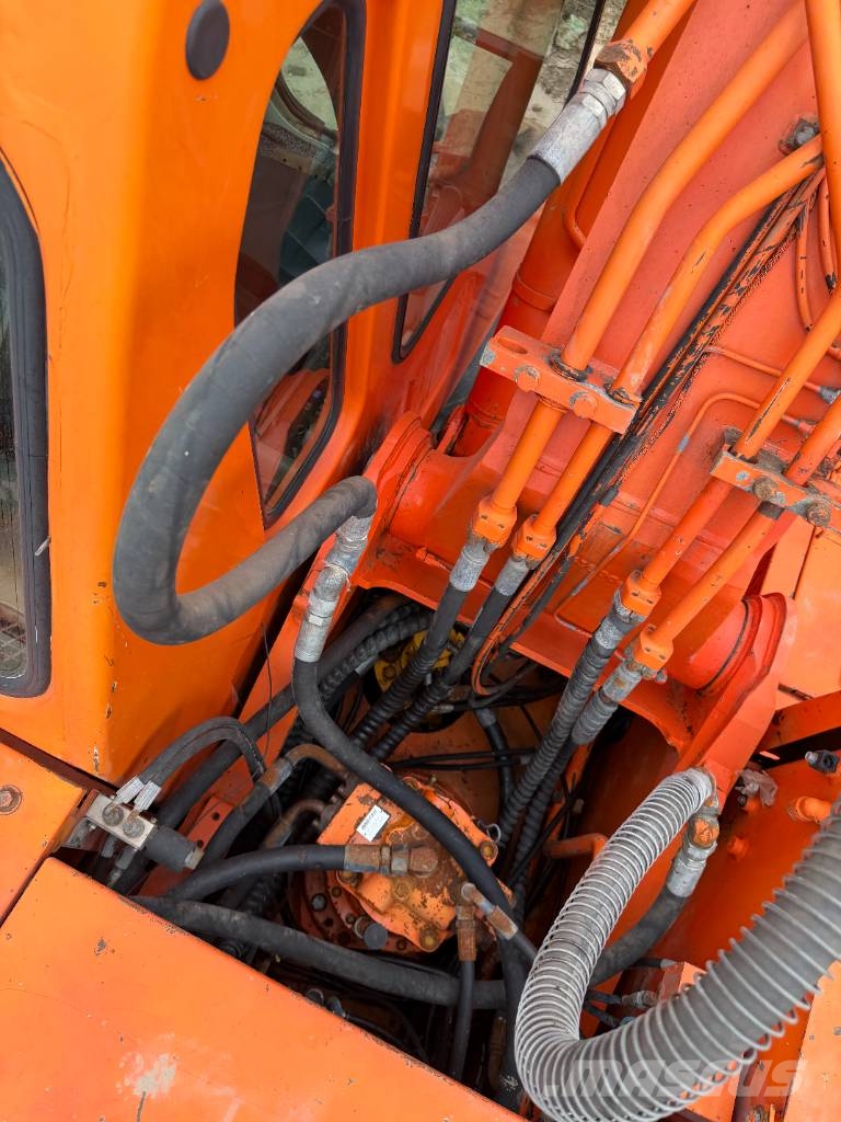 Doosan DH 210 W-7 Source factory Bagri na kolesih