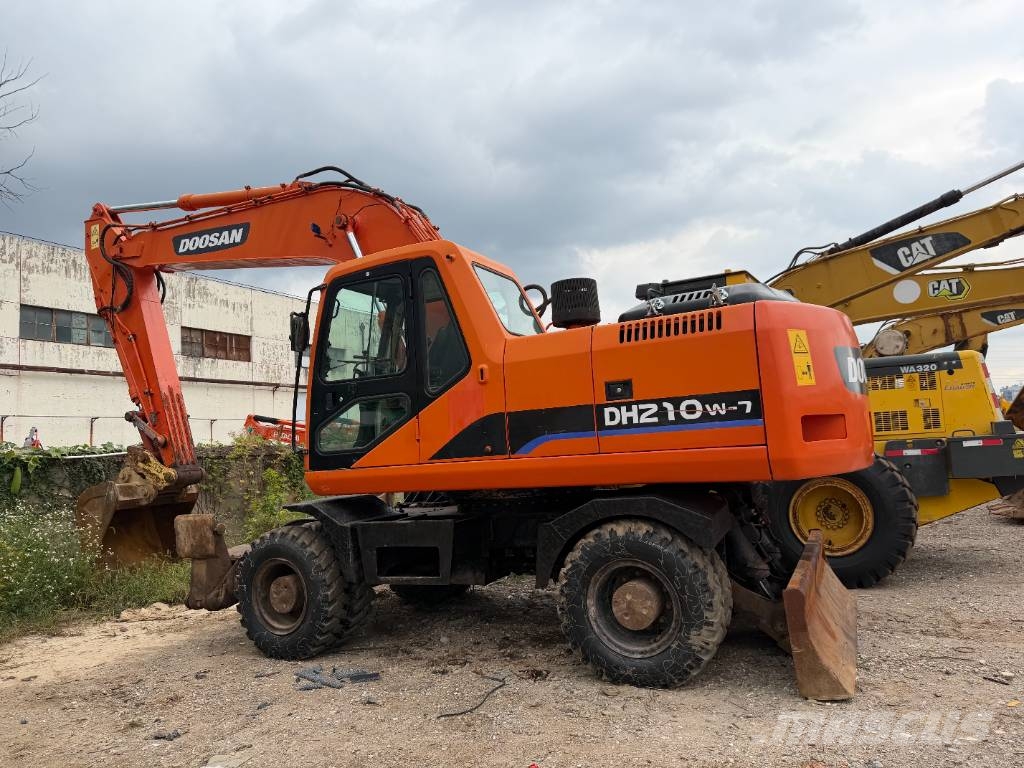 Doosan DH 210 W-7 Source factory Bagri na kolesih