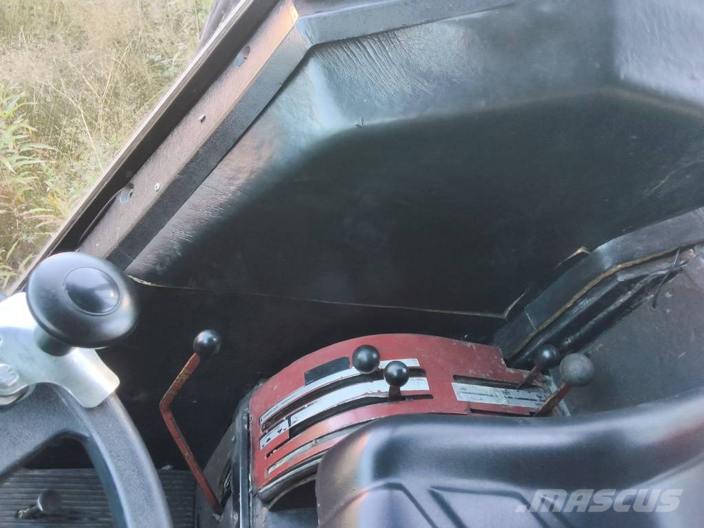 International 574 الجرارات