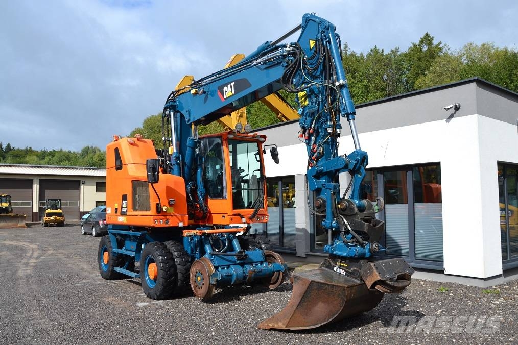 CAT M 323 F Колёсные экскаваторы