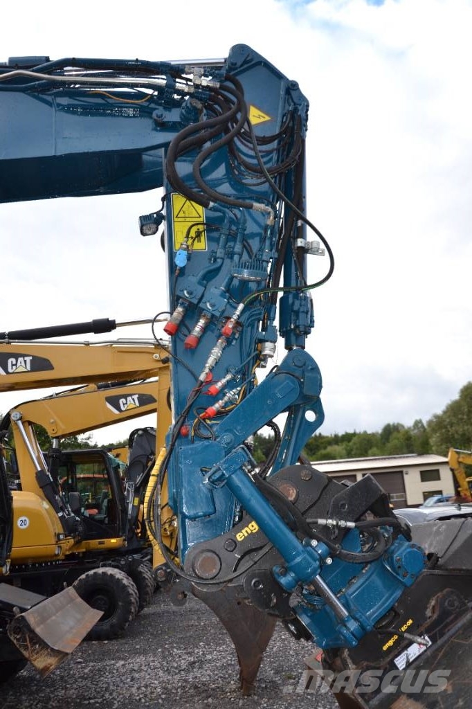CAT M 323 F Колёсные экскаваторы