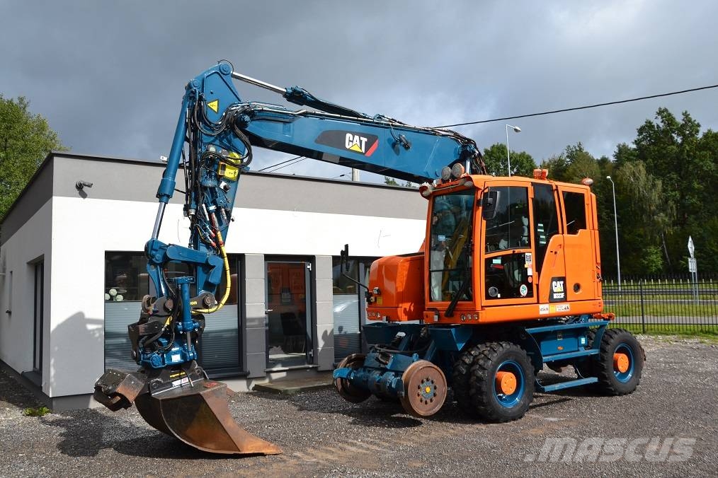 CAT M 323 F Колёсные экскаваторы