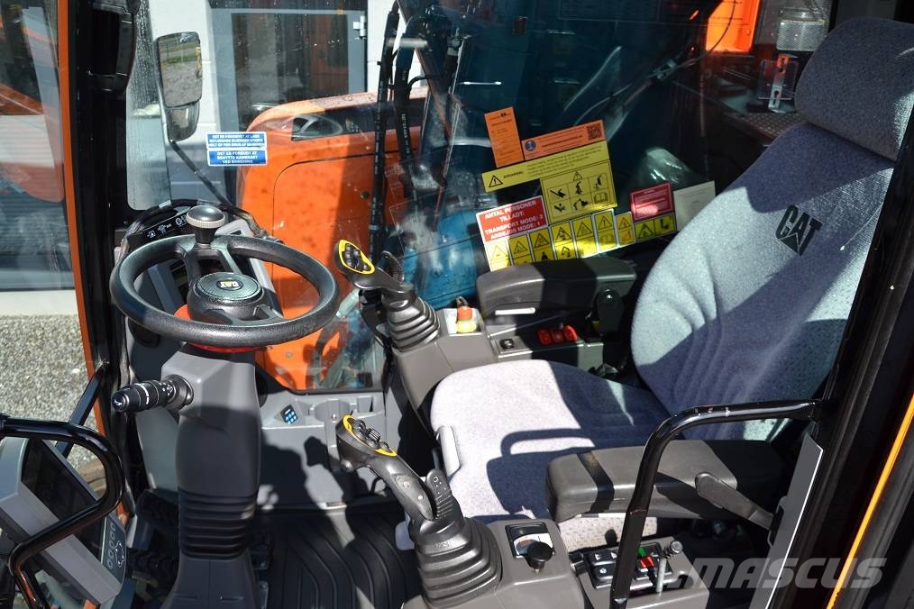 CAT M 323 F Колёсные экскаваторы