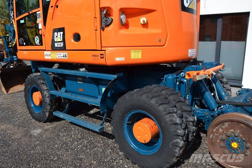 CAT M 323 F Колёсные экскаваторы
