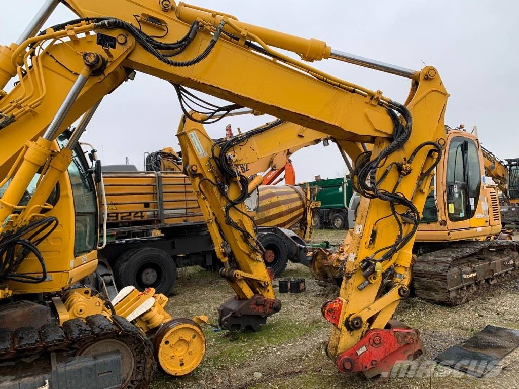 New Holland E 135 SR-1ES RAILWAY حفارات زحافة