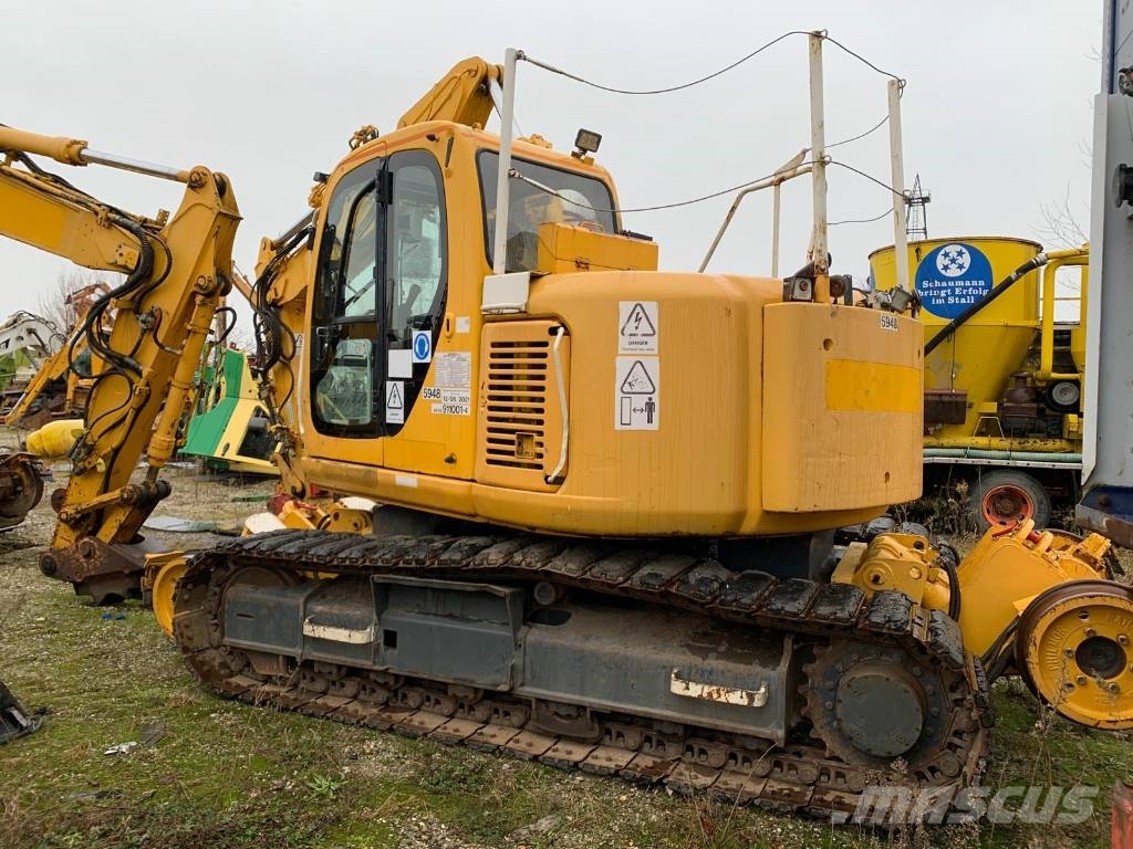 New Holland E 135 SR-1ES RAILWAY حفارات زحافة