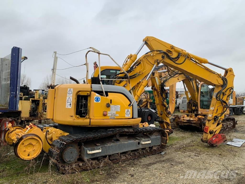 New Holland E 135 SR-1ES RAILWAY حفارات زحافة