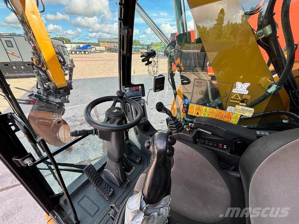 CAT M 315 F TILTROTATOR / AC / CENTRAL LUBRICATION Gumikerekes kotrók
