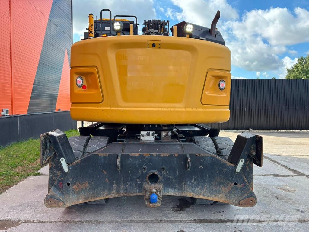 CAT M 315 F TILTROTATOR / AC / CENTRAL LUBRICATION Gumikerekes kotrók