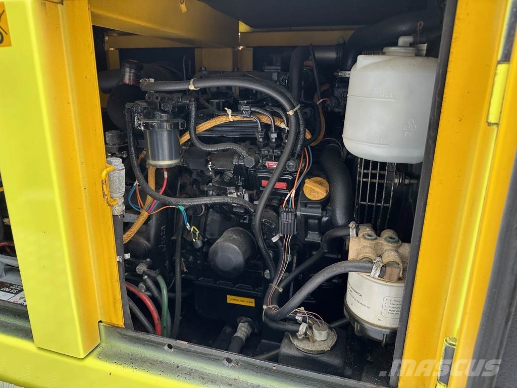 Atlas Copco Unique generator with light pole on trailer! Diesel Generators