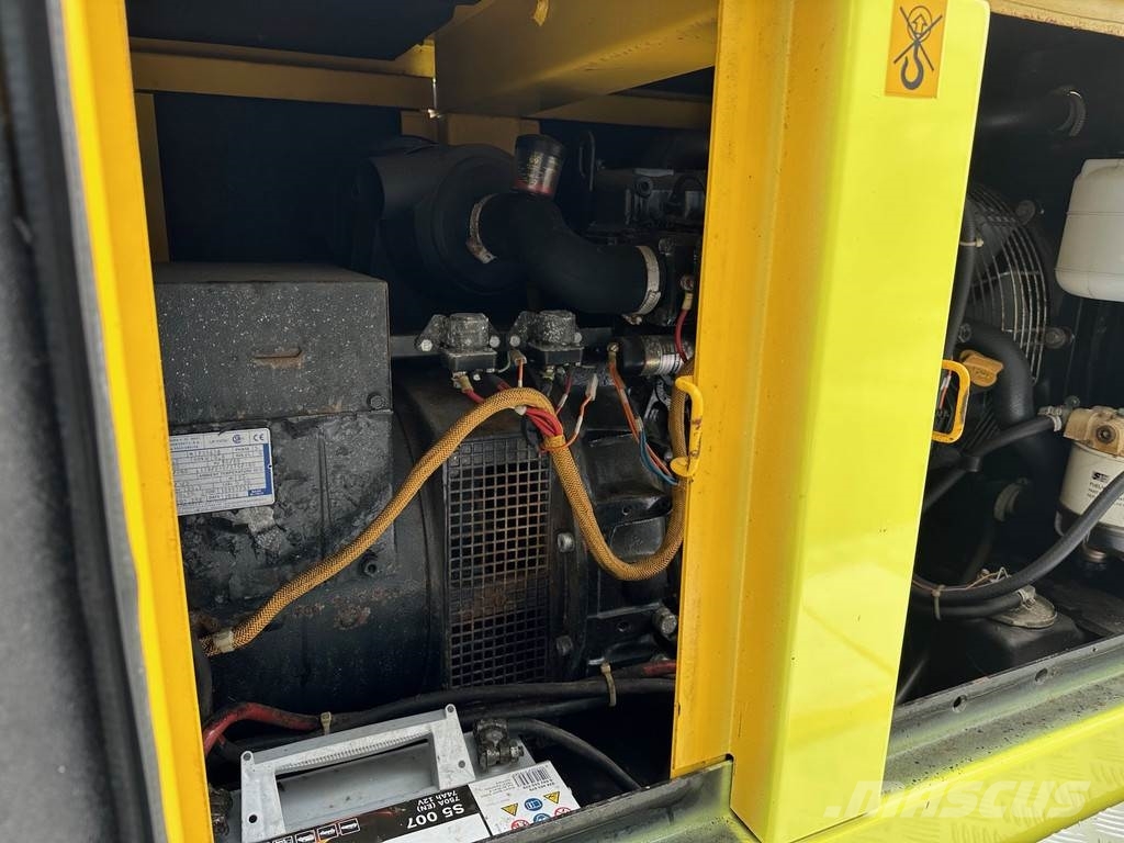 Atlas Copco Unique generator with light pole on trailer! Diesel Generators