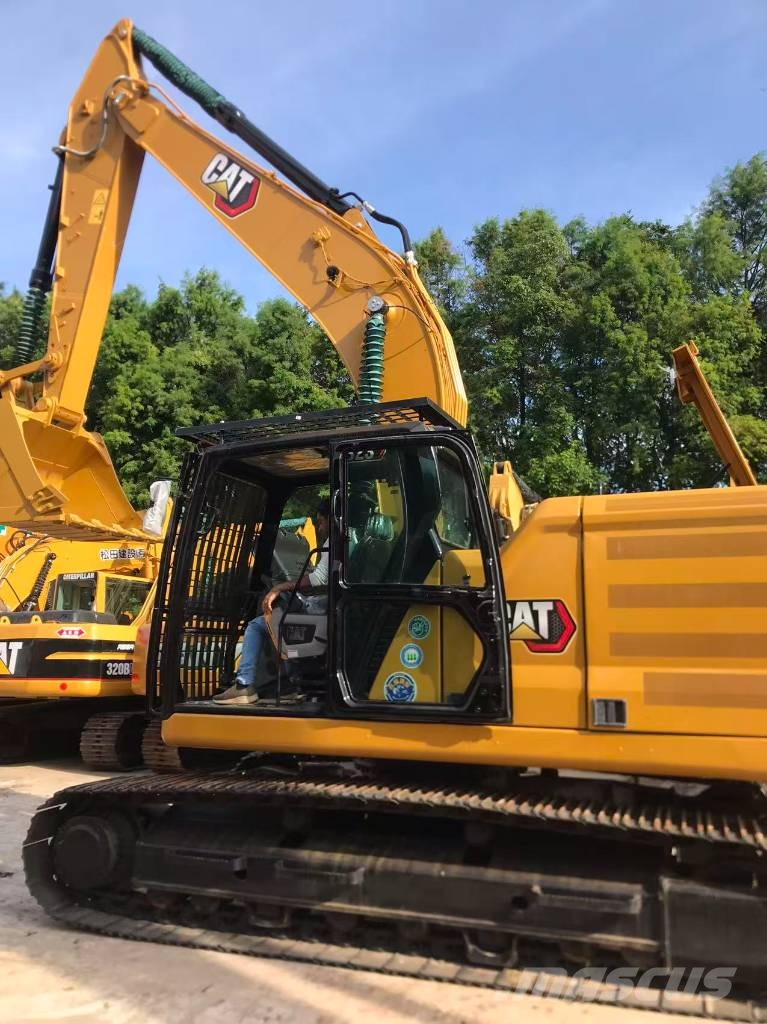 CAT 323 Pelle sur chenilles