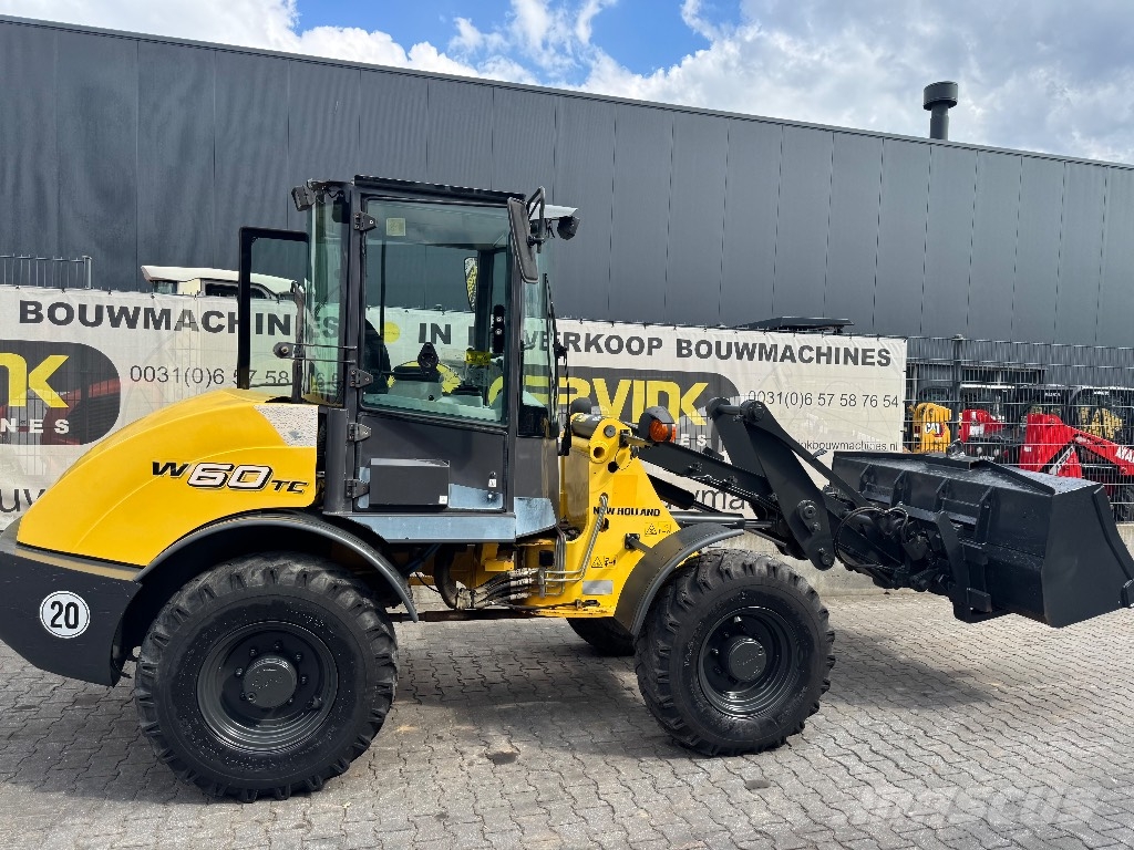 New Holland W 60 TC لوادر بعجل