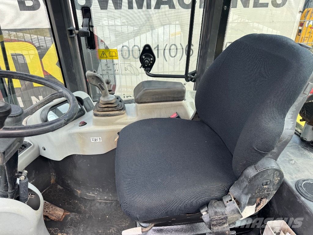 New Holland W 60 TC لوادر بعجل