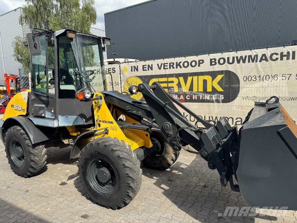 New Holland W 60 TC لوادر بعجل