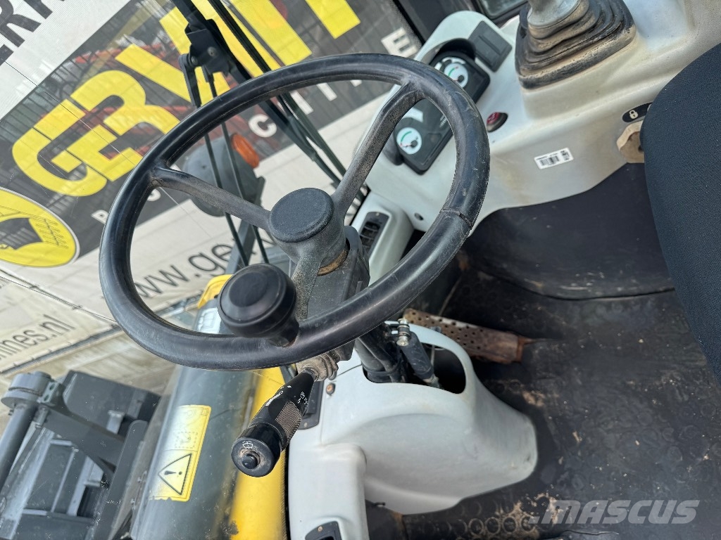 New Holland W 60 TC لوادر بعجل