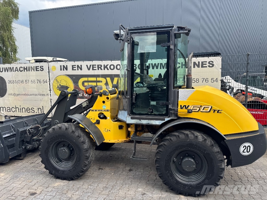 New Holland W 60 TC لوادر بعجل