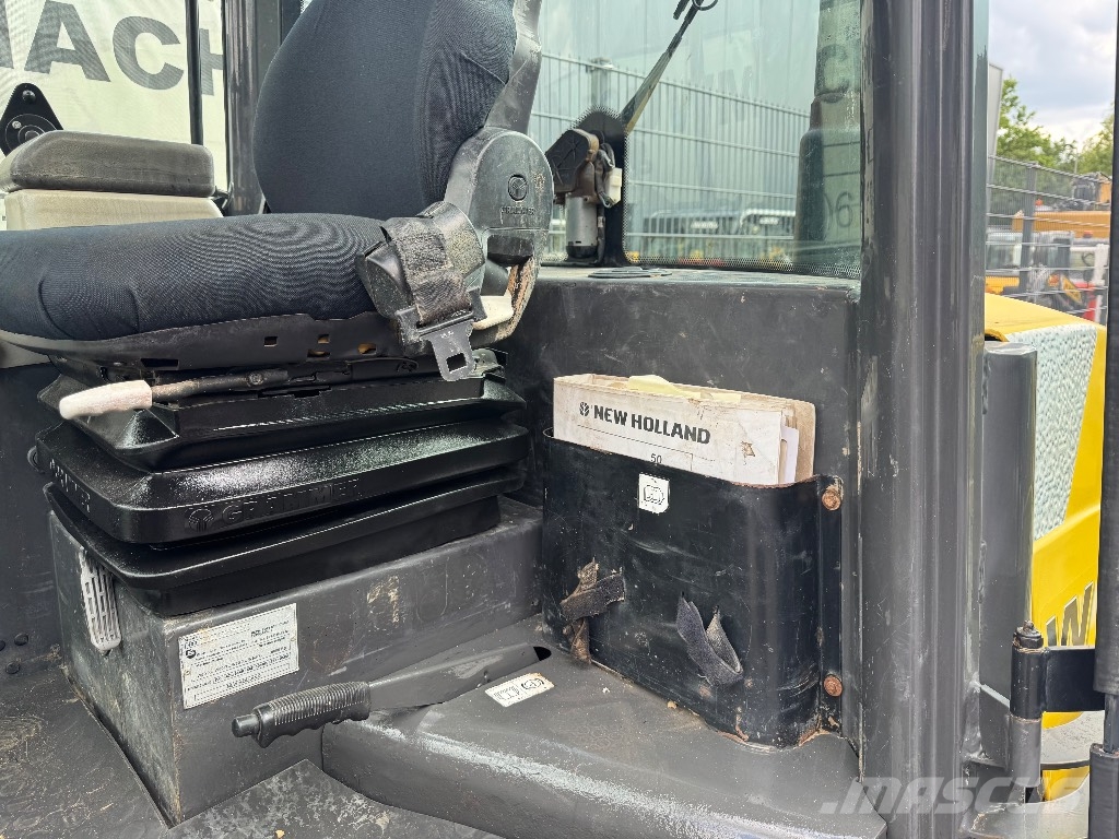 New Holland W 60 TC لوادر بعجل