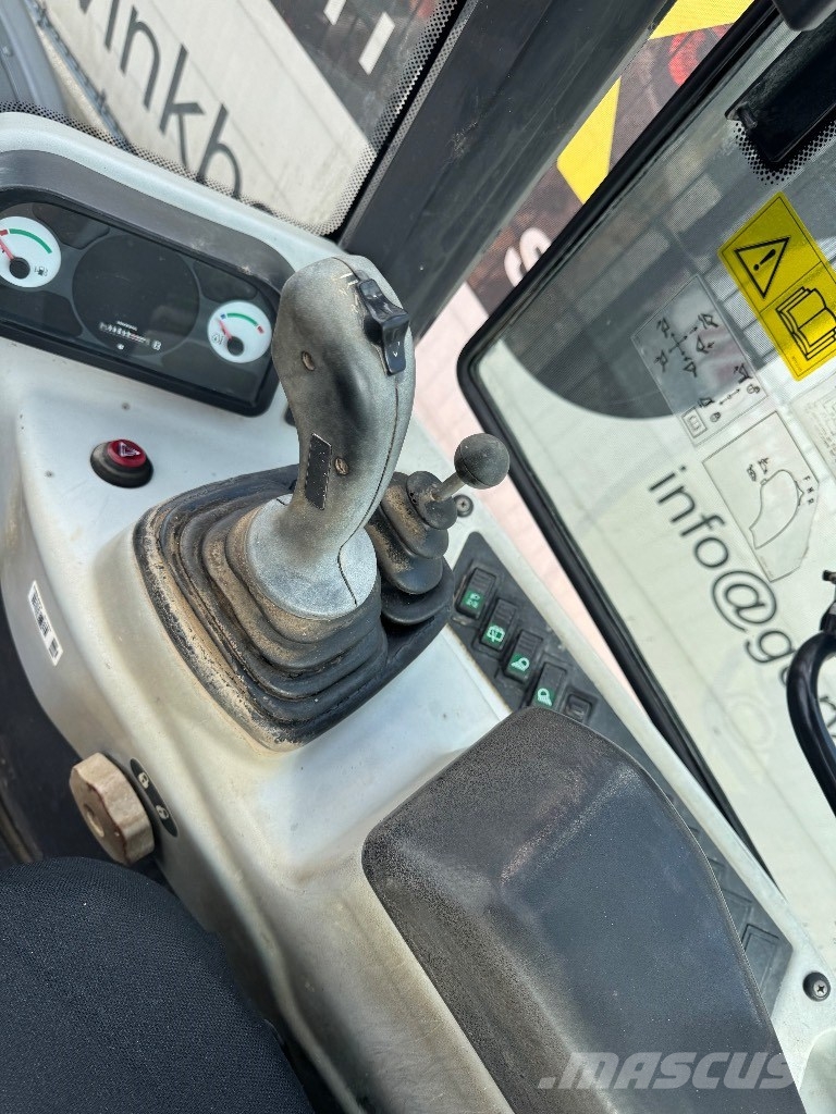 New Holland W 60 TC لوادر بعجل