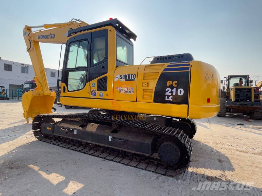 Komatsu PC210 Gravemaskiner på larvebånd