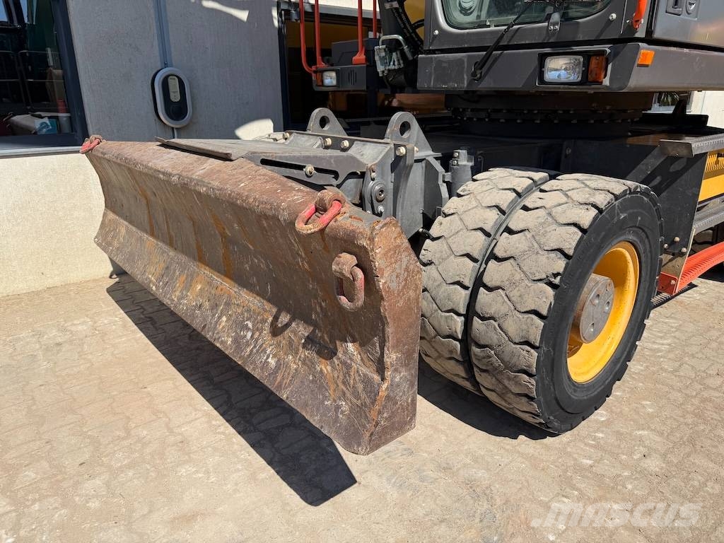 Volvo EW 220 E EW220 - EW 180 - EW 200 حفارات بعجل