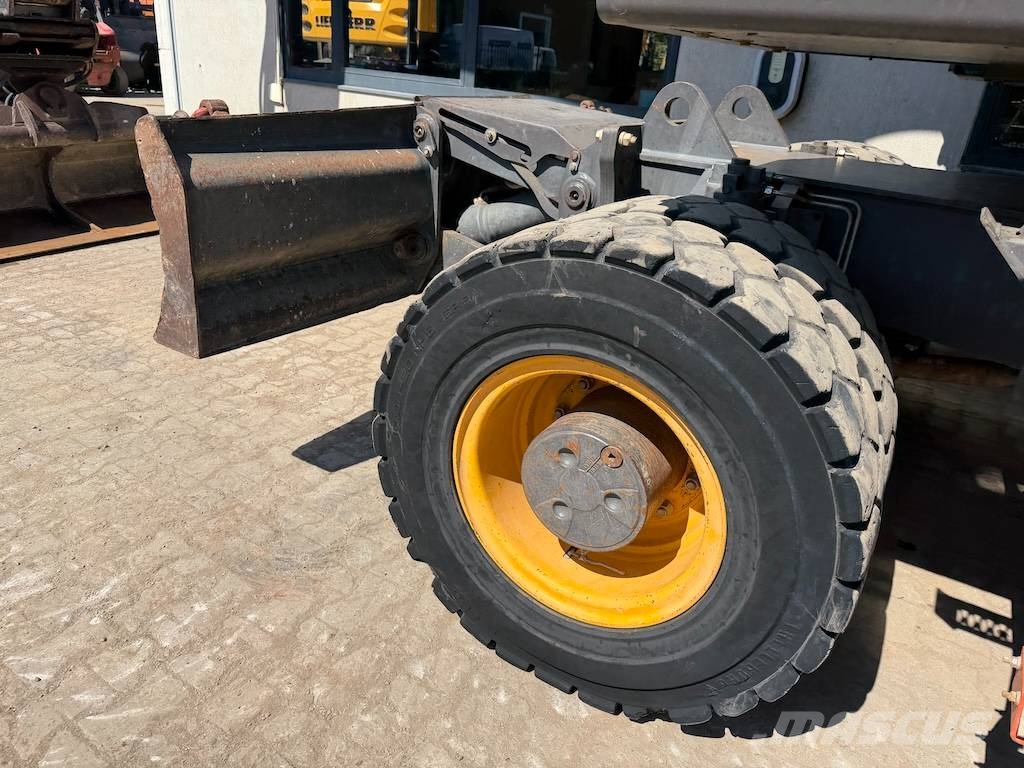 Volvo EW 220 E EW220 - EW 180 - EW 200 حفارات بعجل