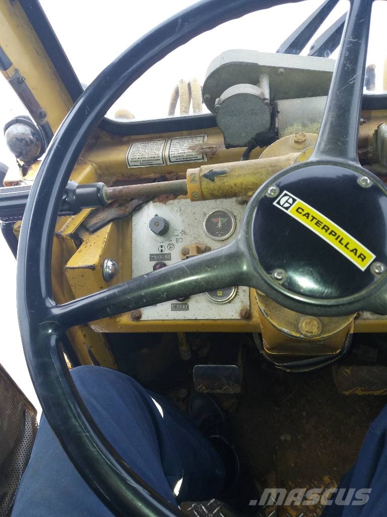 CAT 910 لوادر بعجل