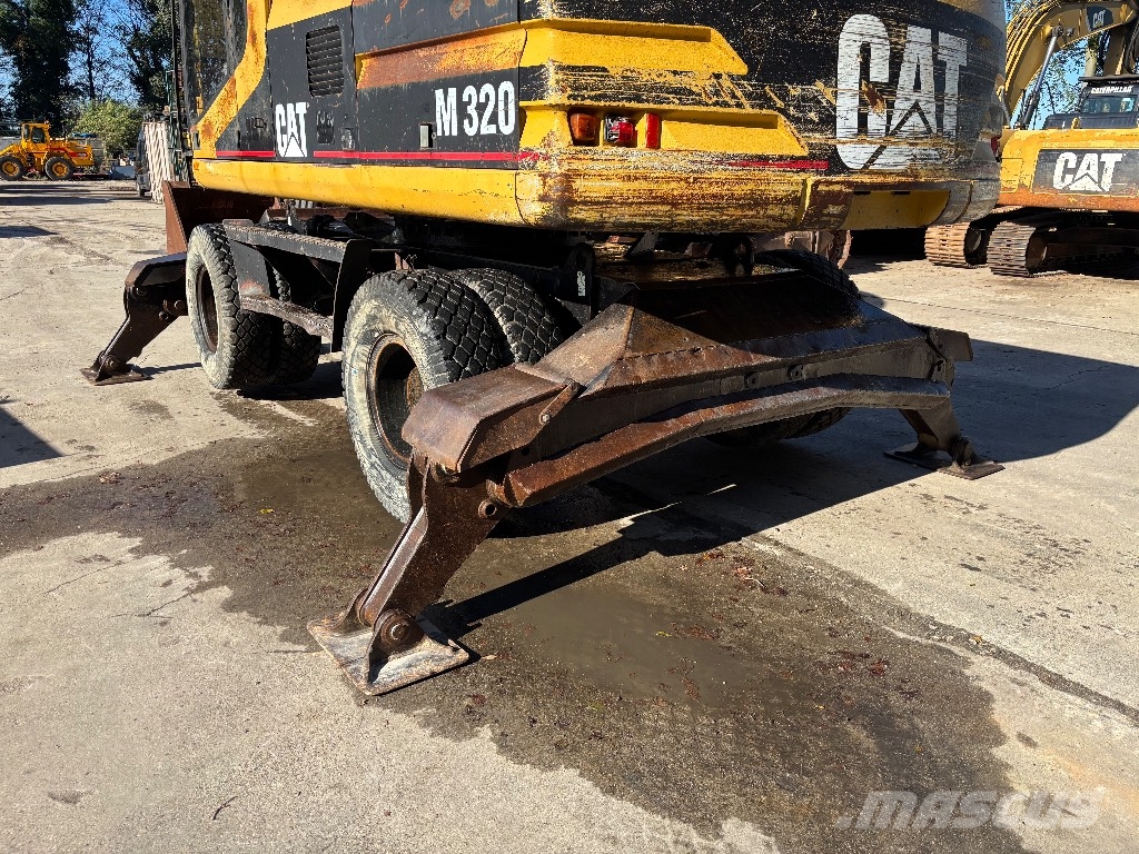 CAT M 320 Wielgraafmachines