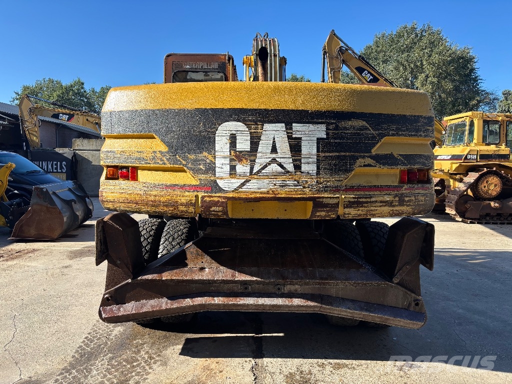 CAT M 320 Wielgraafmachines