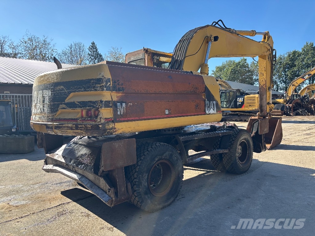 CAT M 320 Wielgraafmachines