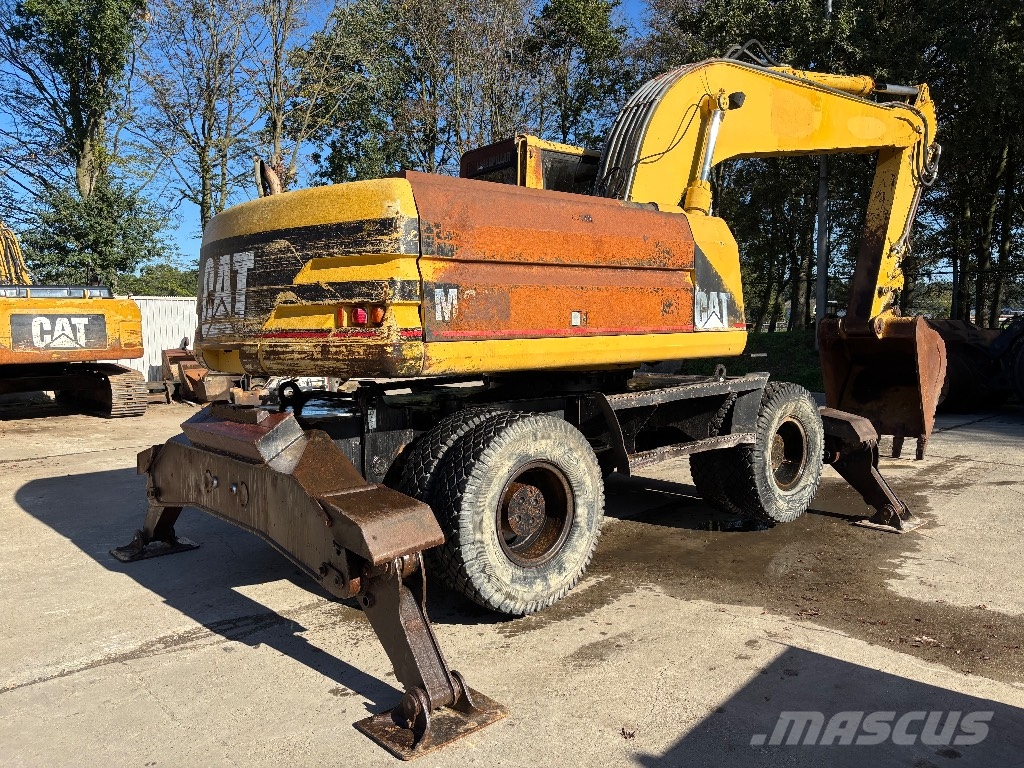 CAT M 320 Wielgraafmachines