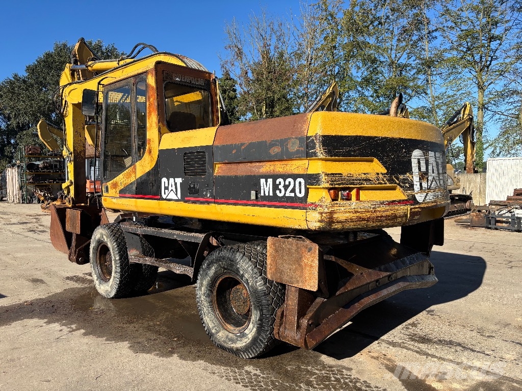 CAT M 320 Wielgraafmachines