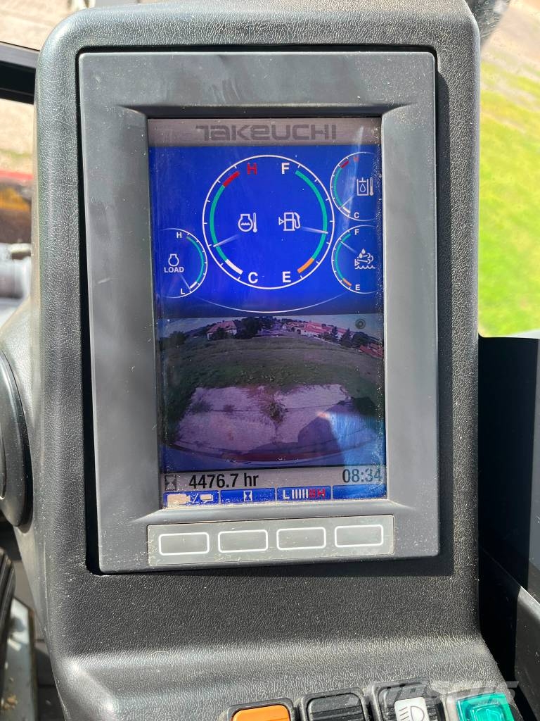 Takeuchi TB 295 W حفارات بعجل