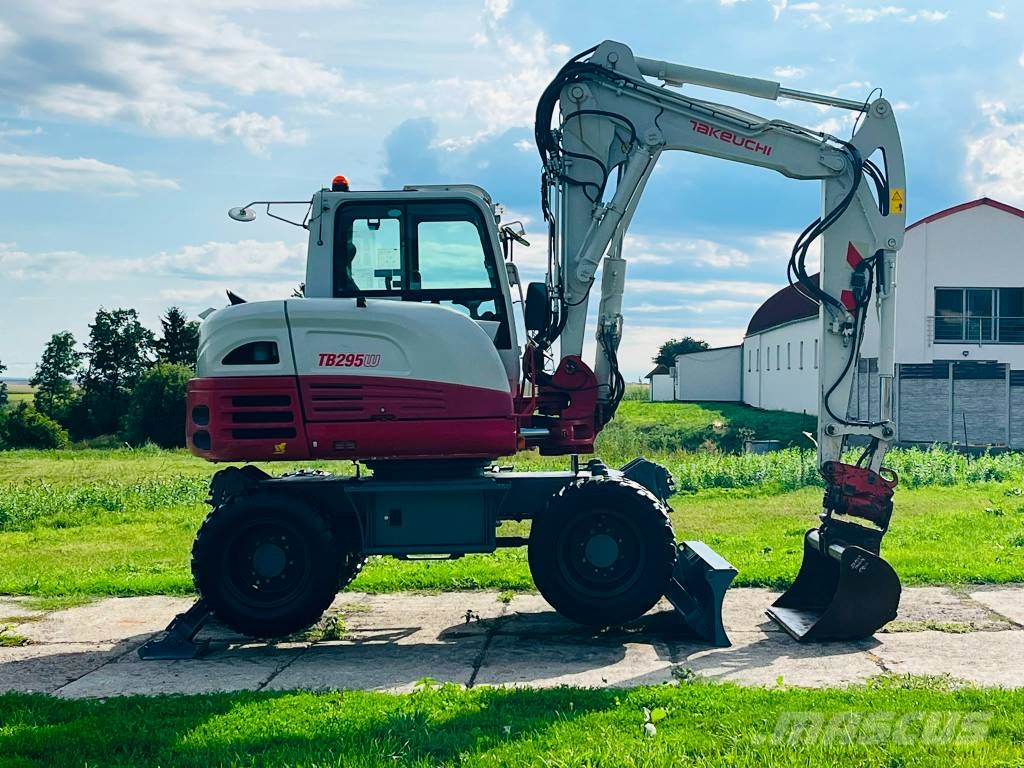 Takeuchi TB 295 W حفارات بعجل
