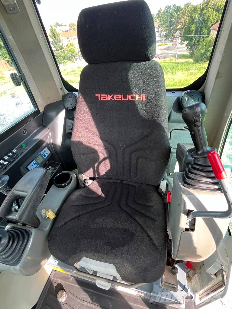Takeuchi TB 295 W حفارات بعجل