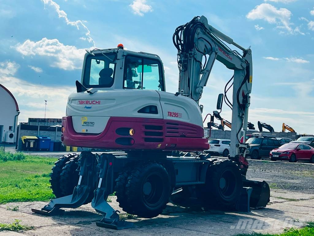 Takeuchi TB 295 W حفارات بعجل