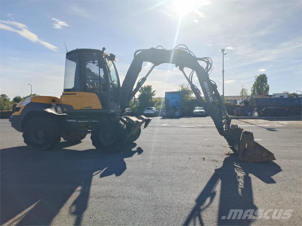 Mecalac 12 MTX Колісні екскаватори