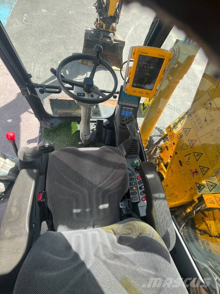 Komatsu PW 148-8 حفارات بعجل
