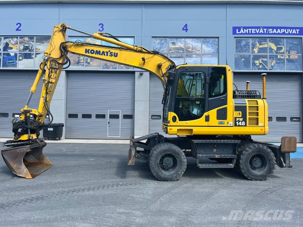 Komatsu PW 148-8 حفارات بعجل