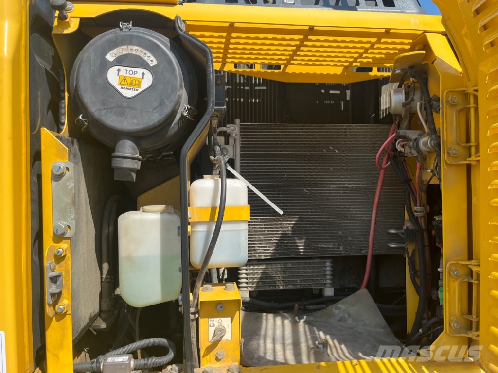 Komatsu PW 148-8 حفارات بعجل