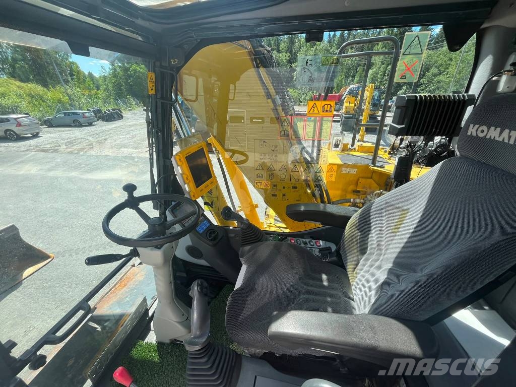 Komatsu PW 148-8 حفارات بعجل
