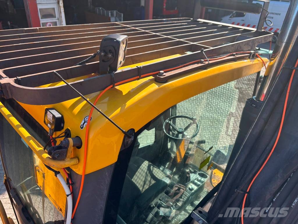 Volvo EW 210 C Bagri na kolesih